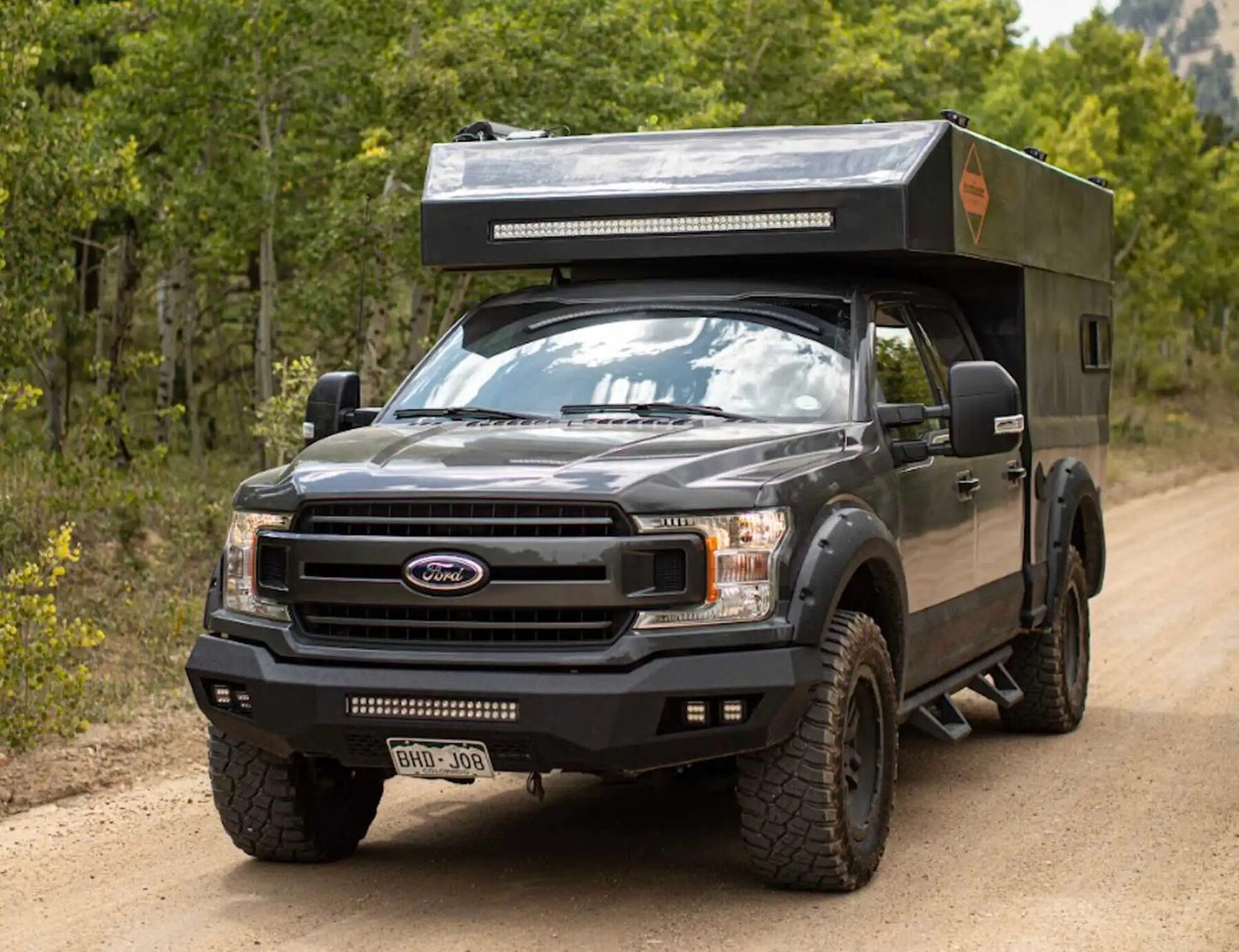2019 Ford F150 XLT 4x4 Rossmonster Baja Truck Camper